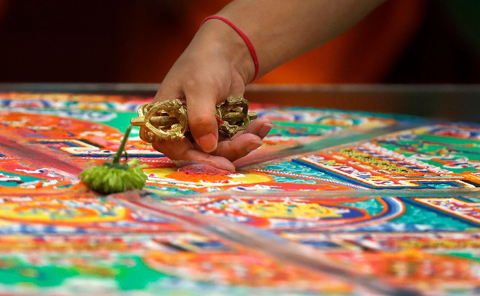 Painstakingly created, then swept away: Tibetan monks' sand mandala at Lily Dale